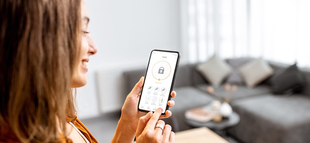 Living Room Woman sitting on her phone in her home